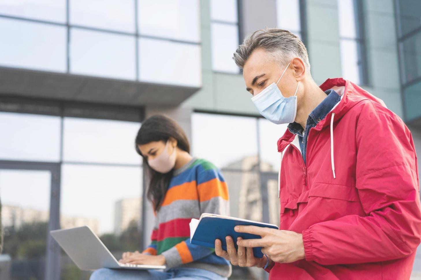 Business owner reviewing payment analytics on tablet